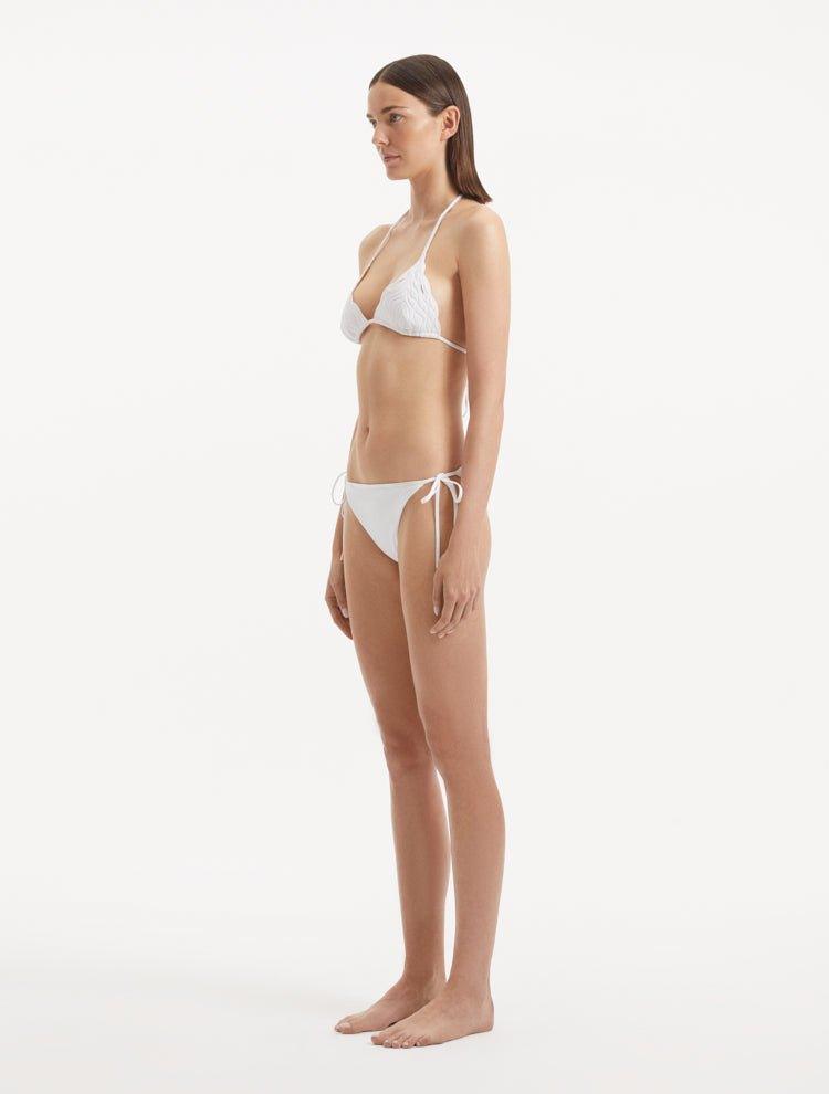 Side view highlighting the sleek silhouette and overall fit of the bikini top.