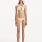 Sarita Yellow Bikini Top showcasing its triangle design and distinctive wavy texture.