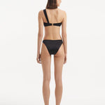 Back view highlighting the full bottom coverage and clean lines of the bikini bottom.