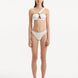 Sereia White Bikini Bottom showcasing its sleek, mid-rise design and pristine white fabric.