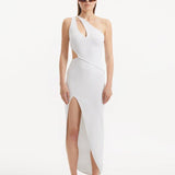 "Model showcasing the Shore White Dress from the front, highlighting its pristine white color, one-shoulder design, and daring slash cut-out detail."