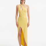 "Model wearing the Shore Yellow Dress from the front, showcasing the vibrant yellow color, one-shoulder design, and the dramatic slash cut-out detail. "