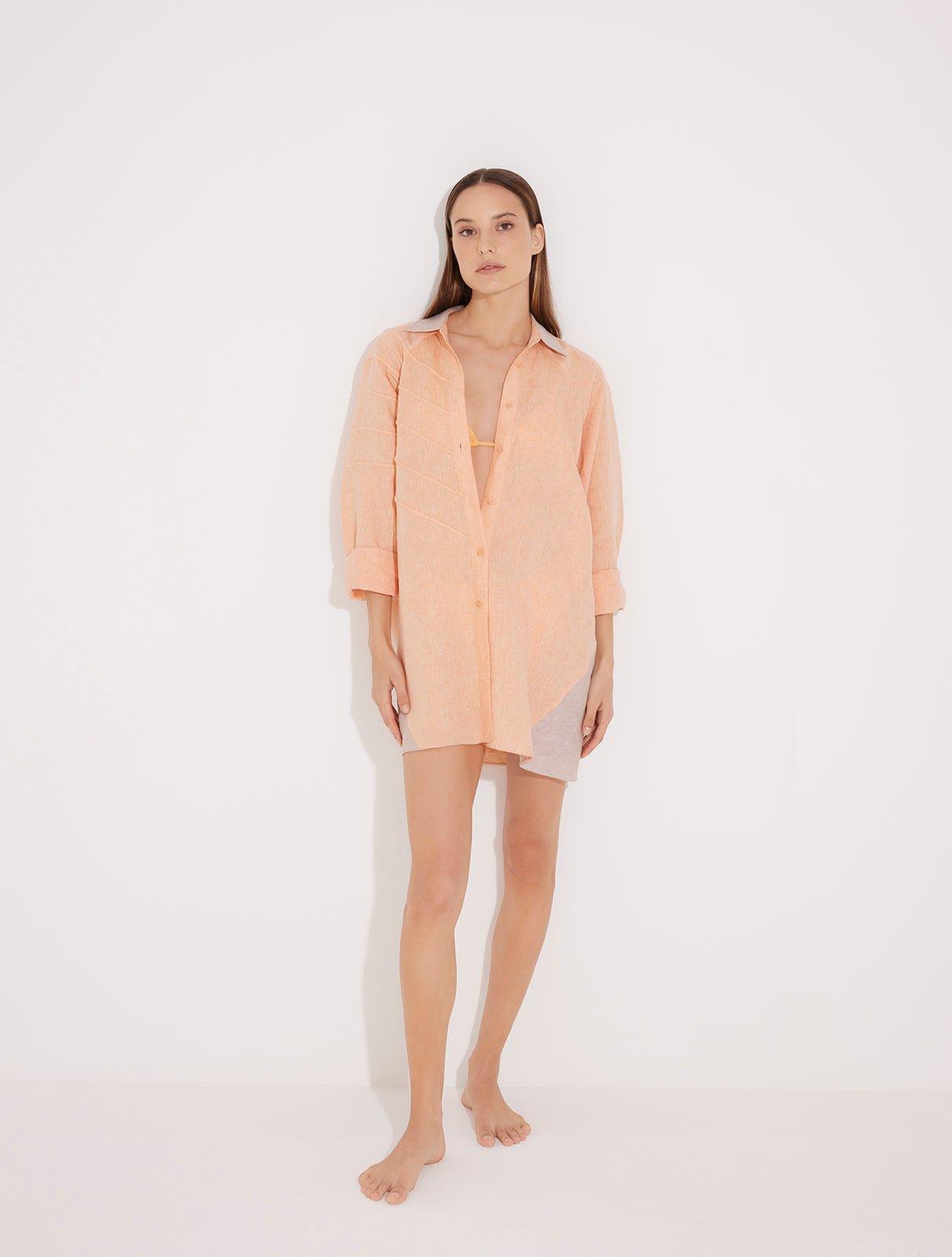 "Front view of a model in the Sibilla Orange/Nude Shirt, displaying its versatile design and buttoned style."