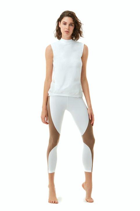 Sienna White Top | Moeva | Sports Tops | Each week unveils new pieces—luxury swimwear, fluid resort silhouettes, and elevated summer-to-evening essentials designed to carry you from coastal escapes to city nights.