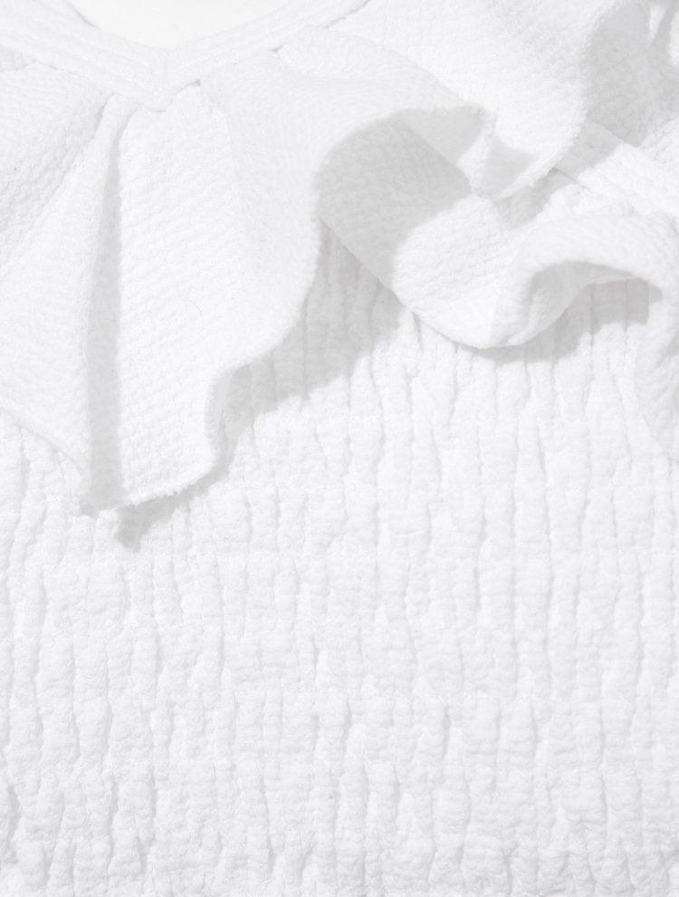 Close-up of the ruffle details and fabric texture, emphasizing the quality and fun design.