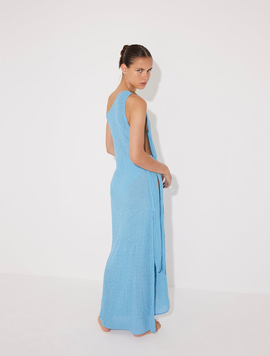 Back View: Model in Stefania Blue Dress - MOEVA Luxury Swimwear, Soft Recycle Fabric, Maxi Dress, Unlined, Recycle Fabric, Comfort Maxi Dress, MOEVA Luxury Swimwear