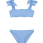 "Front view of the Tia baby blue kids bikini set, showcasing the self-tie straps and ruffle details on the bikini top."