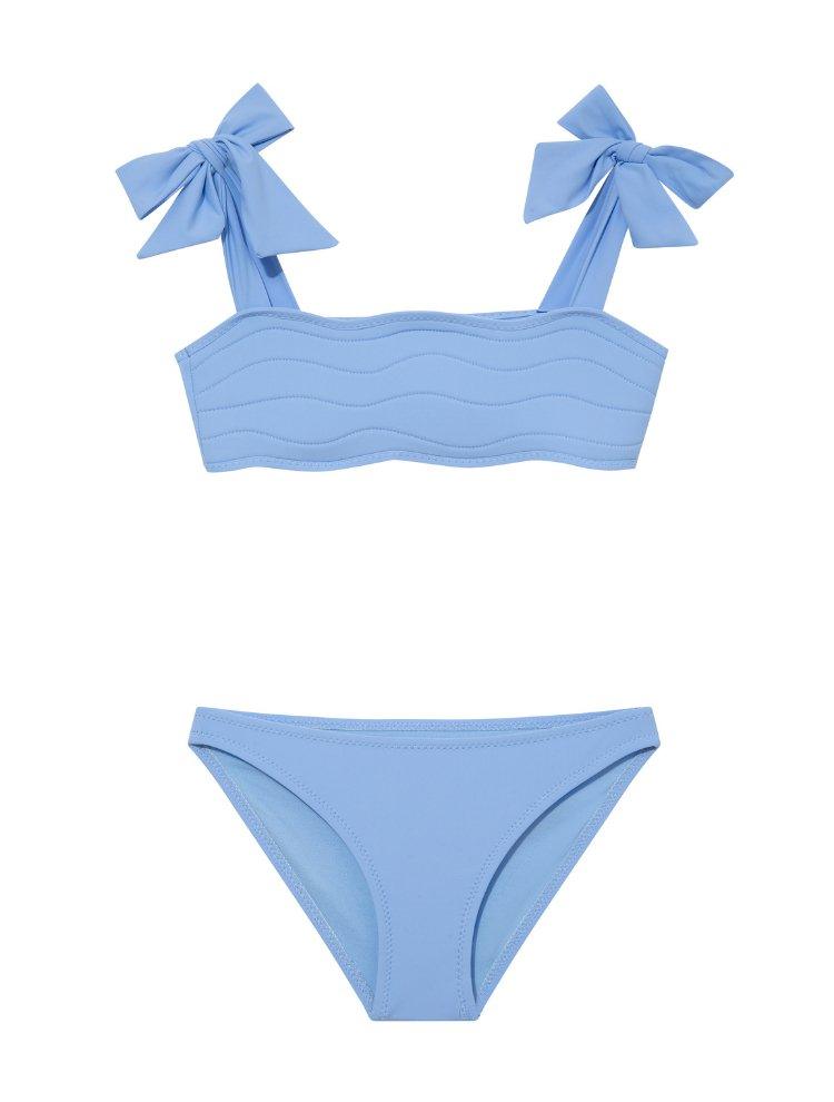 "Front view of the Tia baby blue kids bikini set, showcasing the self-tie straps and ruffle details on the bikini top."