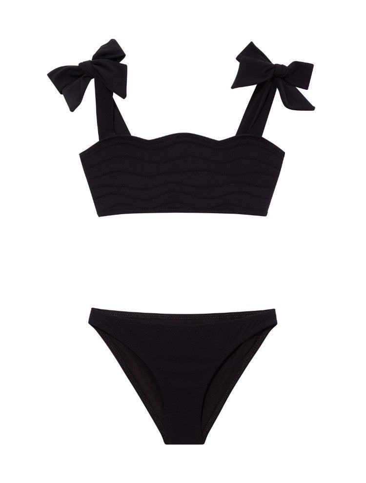 "Front view of the Tia black kids bikini set, highlighting the ruffle details on the bikini top."