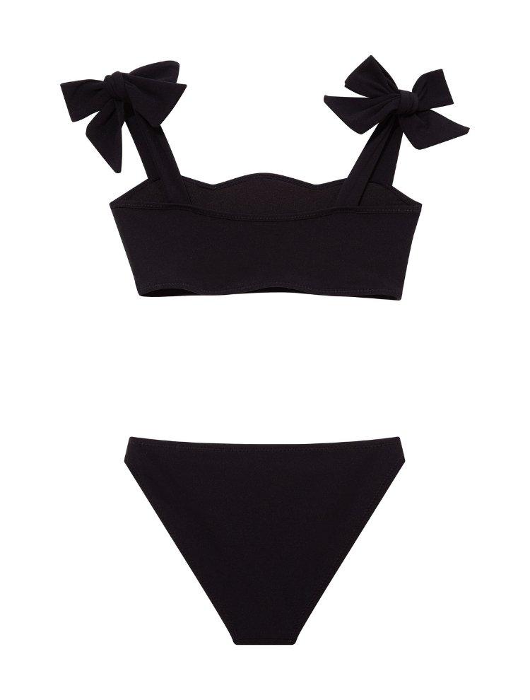 "Back view of the Tia black kids bikini set, focusing on the secure fit of the full-coverage bottoms and adjustable top."