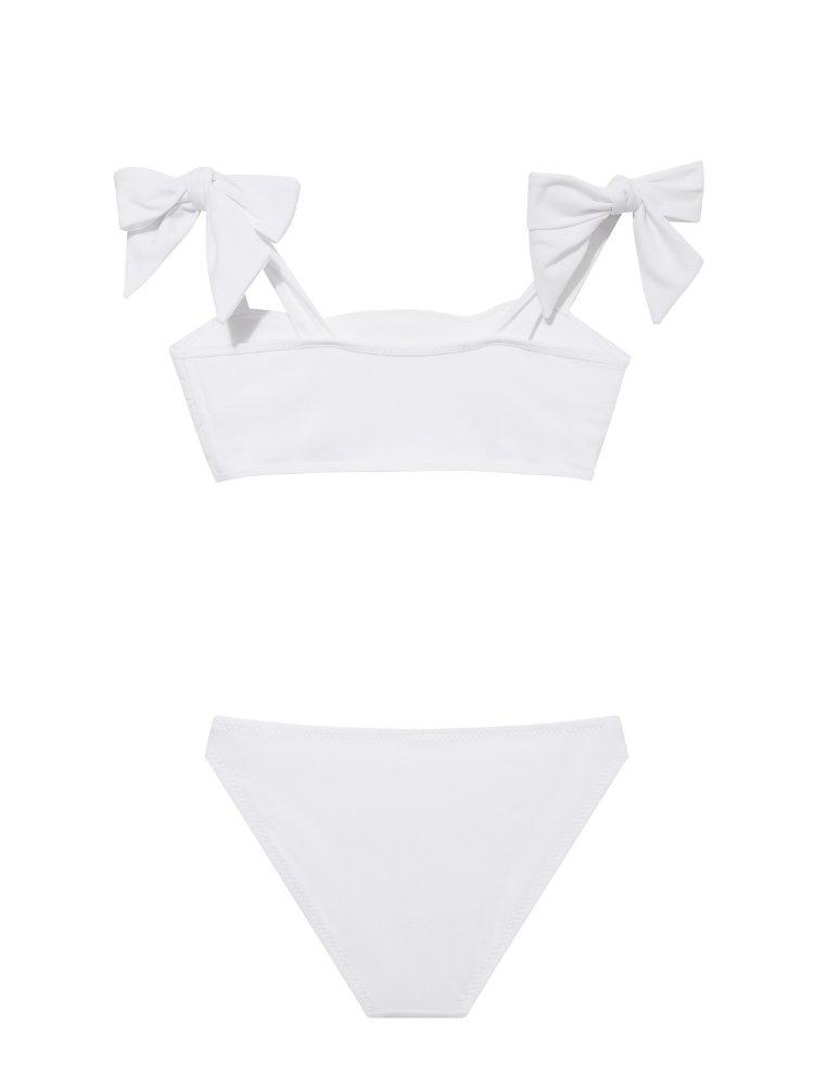 "Back view of the Tia white kids bikini set, focusing on the secure fit of the full-coverage bottoms and adjustable top."