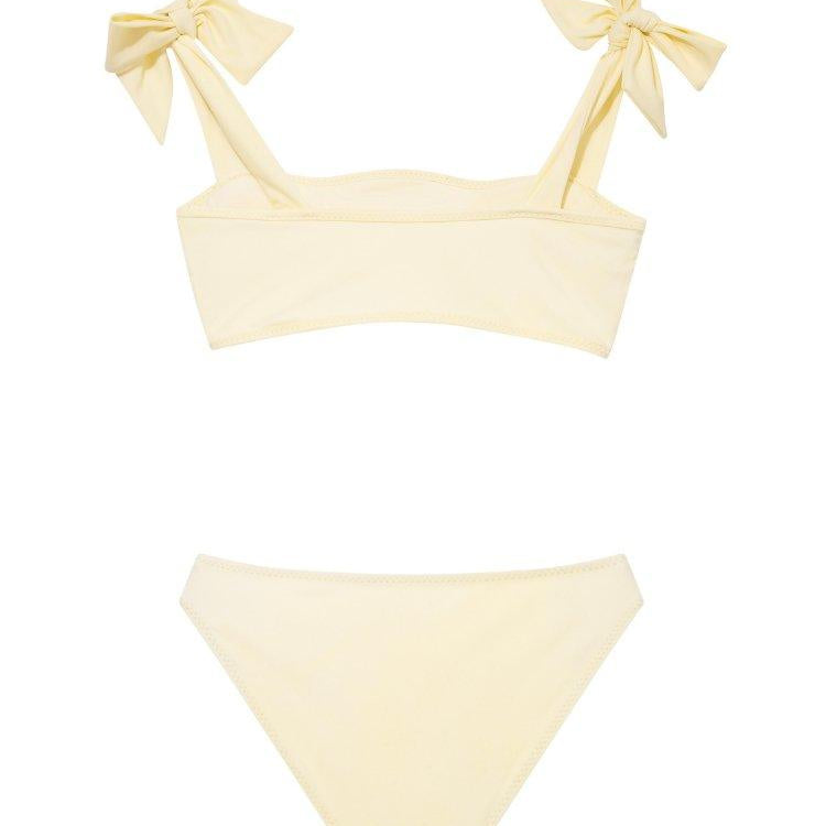 Tia Yellow Kids Bikini Set with Bow Strap Detail | Moeva | Bikini Set | Each week unveils new pieces—luxury swimwear, fluid resort silhouettes, and elevated summer-to-evening essentials designed to carry you from coastal escapes to city nights.