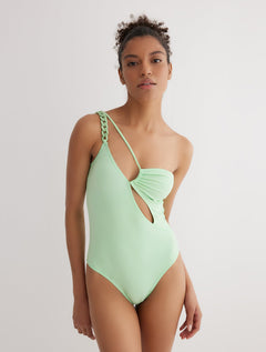 Front View: Model in Tindra Mint Green Swimsuit - MOEVA Luxury Swimwear, One Shouldered, ABS Chain Straps, Ruched Detail in the Top, MOEVA Luxury Swimwear