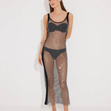 "Front view of a model in the Triana Black Dress, showcasing its close fit and elegant décolleté."
