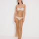 "Front view of a model in the Triana Nude Dress, showcasing its close fit and elegant décolleté."