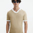 "Front view of Troy nude and white duo-colored t-shirt displaying the slim fit and open collar design"