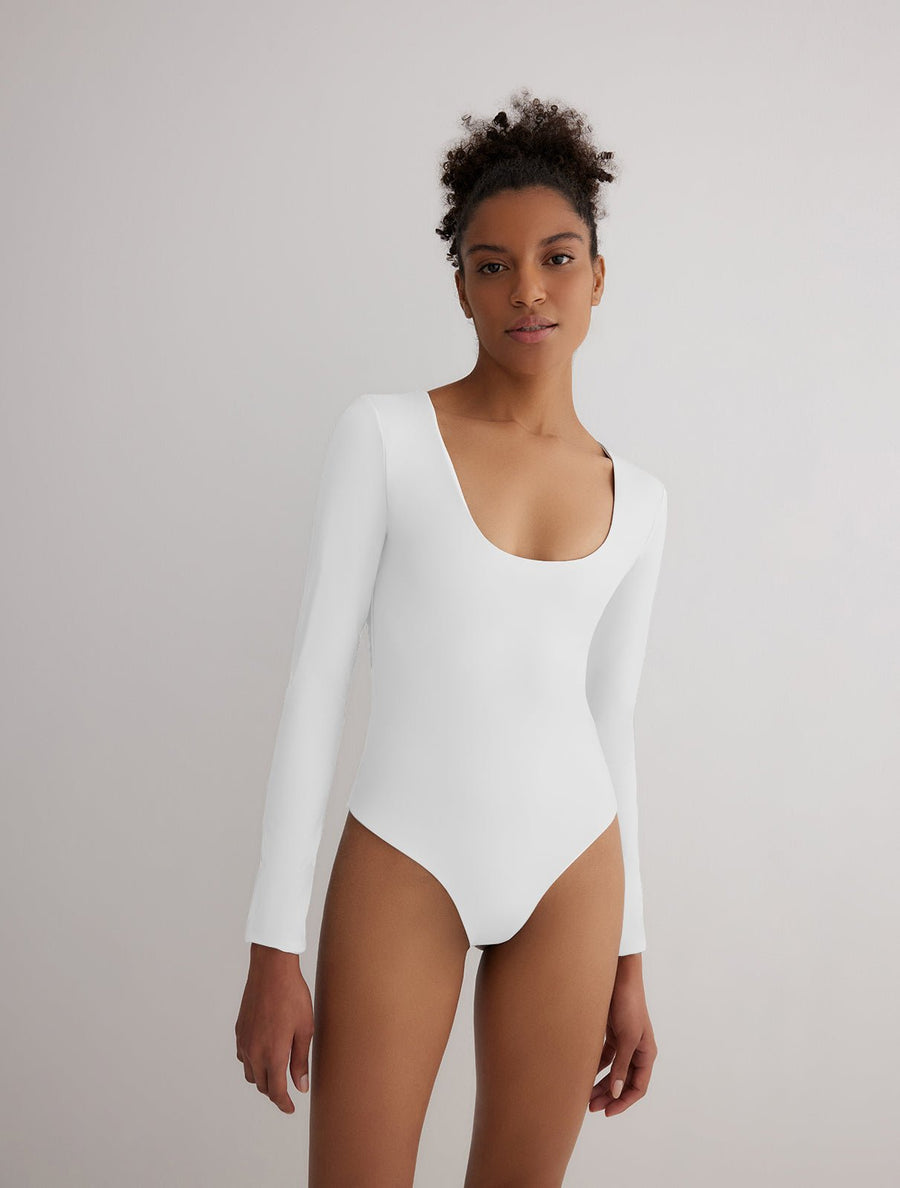 Front View: Model in Ulrika Grey/White Reversible Bodysuit - MOEVA Luxury Swimwear, Stretchy Fabric, French & Italian Fabric, Special Lycra Xtralife Certificate, MOEVA Luxury Swimwear