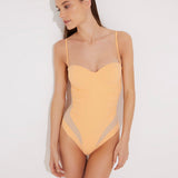 "Model wearing the Vivia Orange/Nude Molded Cup Strapless Swimsuit from the front, showcasing the geometric embroidery that contours the figure and the molded cups that offer support and a push-up effect. "