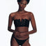 "Front view of the Wendy Seersucker Black Bikini Top with notched bandeau design and gold eyelets."