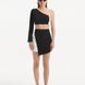 Winslet Black White Crop Top and India Skirt front view showing one-shoulder design with single long sleeve and shell-shaped gold accessories."