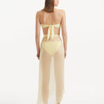"Back view of the Xander Yellow Skort, illustrating the ankle-length silhouette and the high-rise waistband."