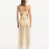 "Back view of the Xander Yellow Skort, illustrating the ankle-length silhouette and the high-rise waistband."