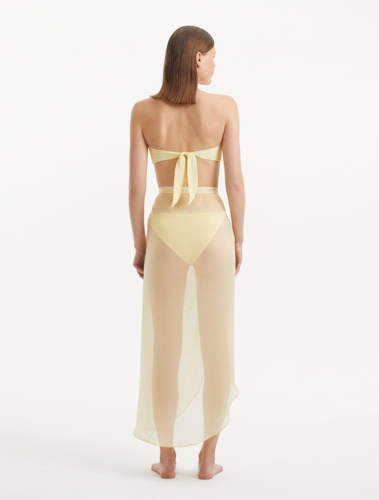 "Back view of the Xander Yellow Skort, illustrating the ankle-length silhouette and the high-rise waistband."