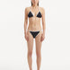 Front view of the Zarya Black Bikini Bottom, showcasing its low-rise cut and duo-colored design.