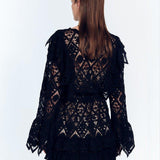 Zhen Black Lace Midi Dress with Ruffle Detail | Moeva | Beachwear Dresses | Each week unveils new pieces—luxury swimwear, fluid resort silhouettes, and elevated summer-to-evening essentials designed to carry you from coastal escapes to city nights.