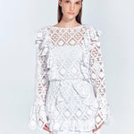 Zhen White Lace Midi Dress with Ruffle Detail | Moeva | Beachwear Dresses | Each week unveils new pieces—luxury swimwear, fluid resort silhouettes, and elevated summer-to-evening essentials designed to carry you from coastal escapes to city nights.
