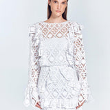Zhen White Lace Midi Dress with Ruffle Detail | Moeva | Beachwear Dresses | Each week unveils new pieces—luxury swimwear, fluid resort silhouettes, and elevated summer-to-evening essentials designed to carry you from coastal escapes to city nights.