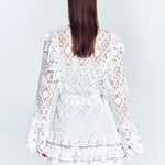 Zhen White Lace Midi Dress with Ruffle Detail | Moeva | Beachwear Dresses | Each week unveils new pieces—luxury swimwear, fluid resort silhouettes, and elevated summer-to-evening essentials designed to carry you from coastal escapes to city nights.