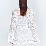 Zhen White Lace Midi Dress with Ruffle Detail | Moeva | Beachwear Dresses | Each week unveils new pieces—luxury swimwear, fluid resort silhouettes, and elevated summer-to-evening essentials designed to carry you from coastal escapes to city nights.